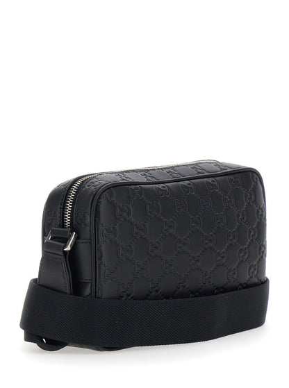Gucci Men 'Emblem' Black Crossbody Bag With Adjustable Shoulder Strap And All-Over Embossed Gg Motif In Leather Man