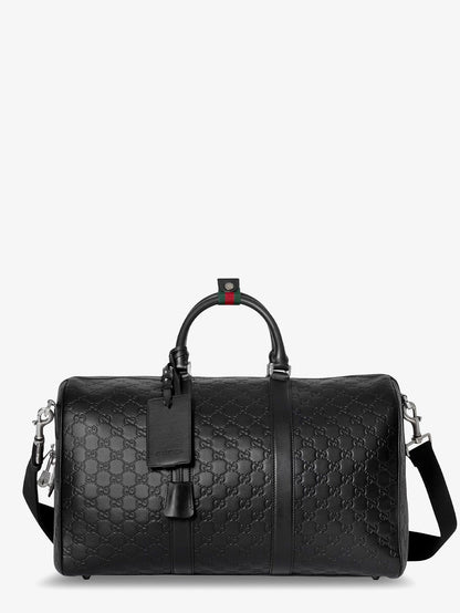 Gucci Men Coated Canvas Gg Emblem Travel Bag With Gg Motif