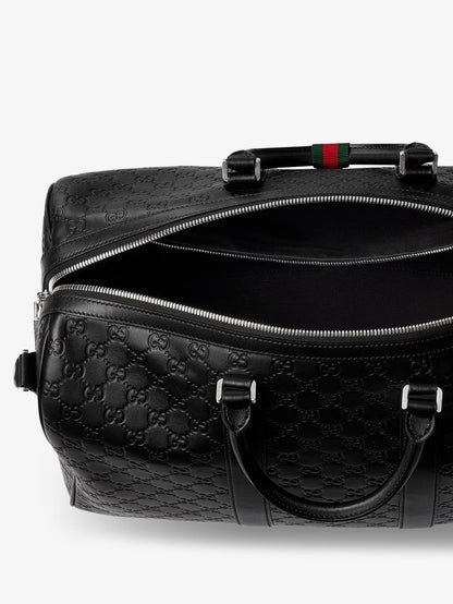 Gucci Men Coated Canvas Gg Emblem Travel Bag With Gg Motif